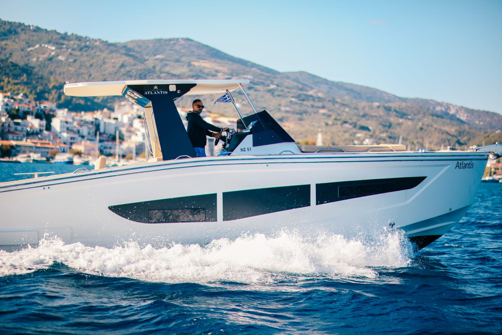 Yacht's professional crew preparing for departure at marina