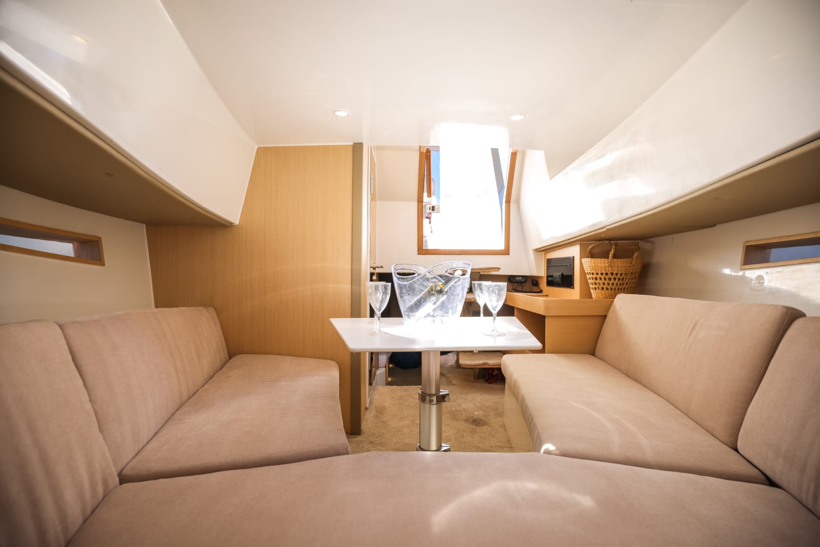 Elegant yacht interior with modern furnishings and large windows